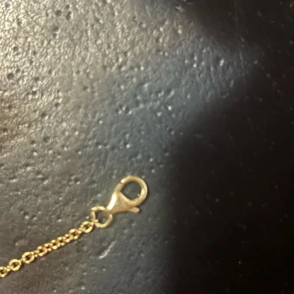 Cartier Gold Interlocking Rings Bracelet with Delicate Chain - Picture 3 of 12